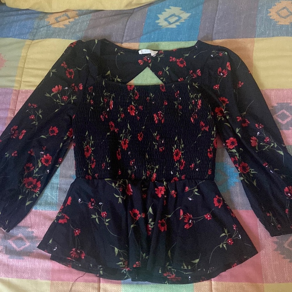 Black top with rose/floral imprints, size: S